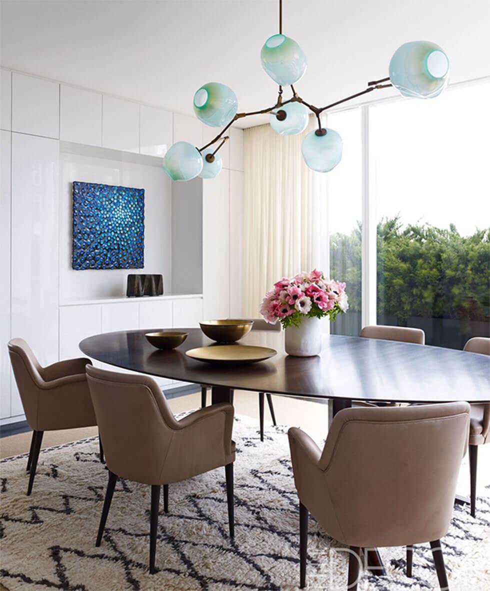 Modern dining room with sculptural pendant lamp