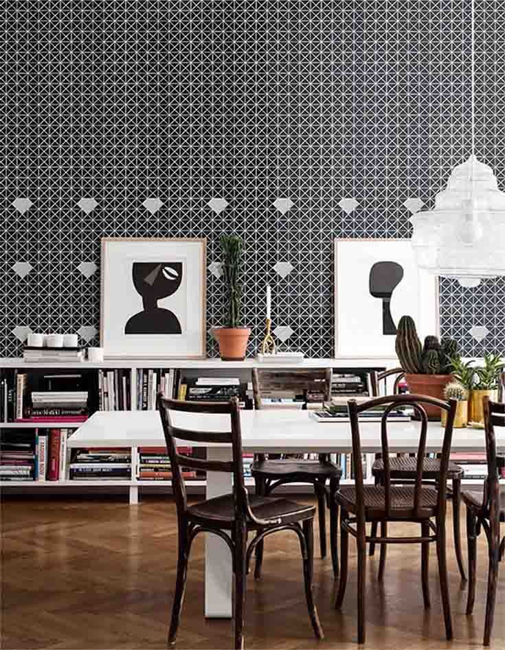 Modern dining room with geometric feature wall