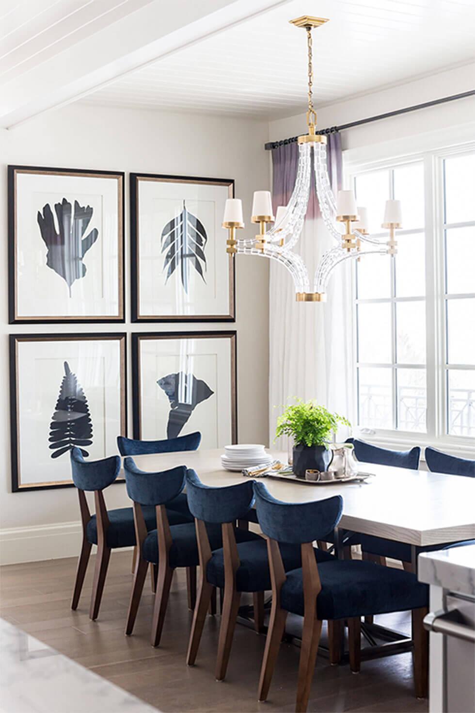 Elegant dining room with framed prints