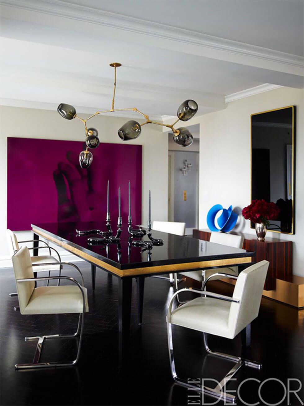 Modern dining room with black table and chrome chairs