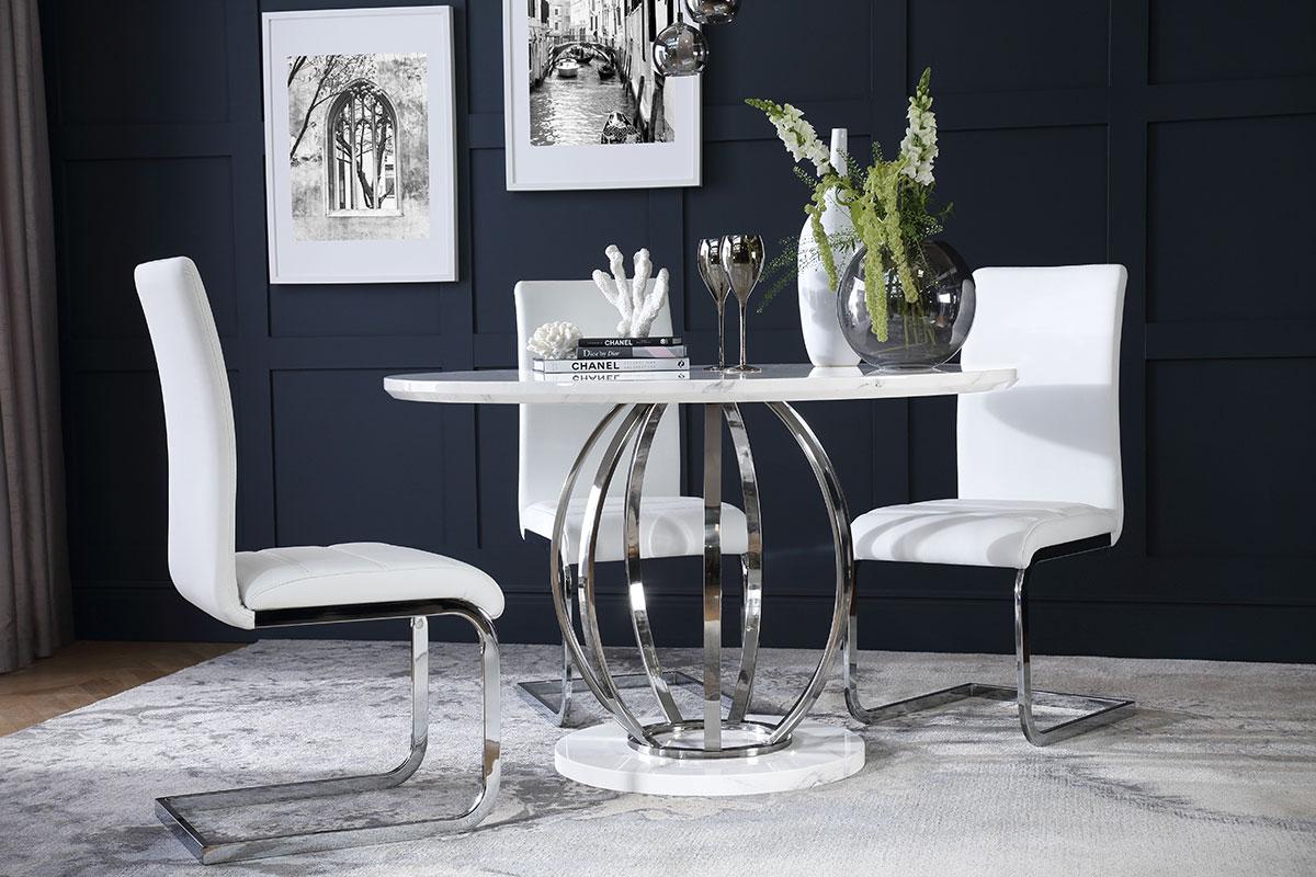 Modern dining room with contemporary white dining set and dark blue walls