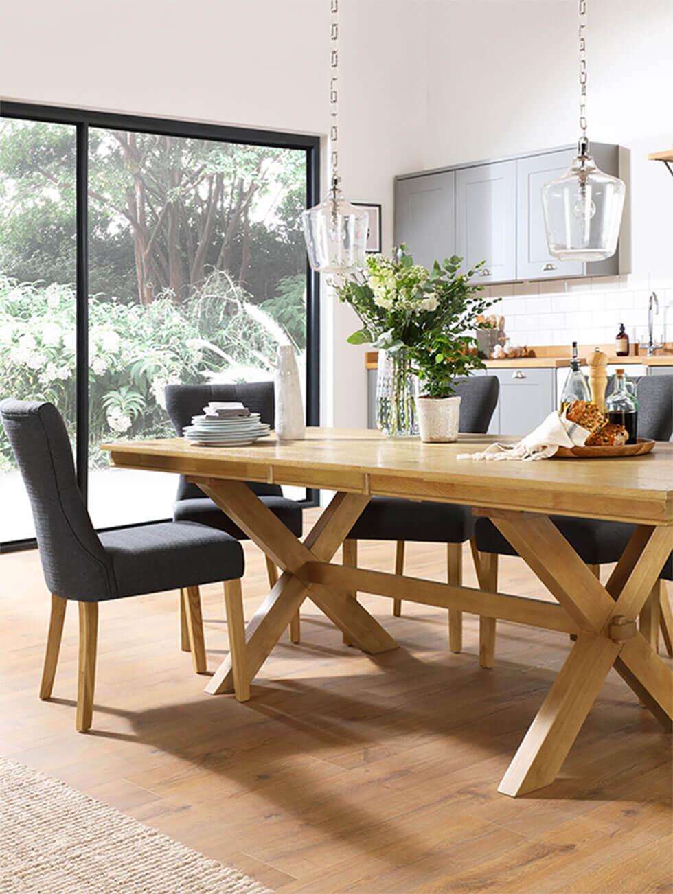 Wooden dining set with dark grey fabric chairs