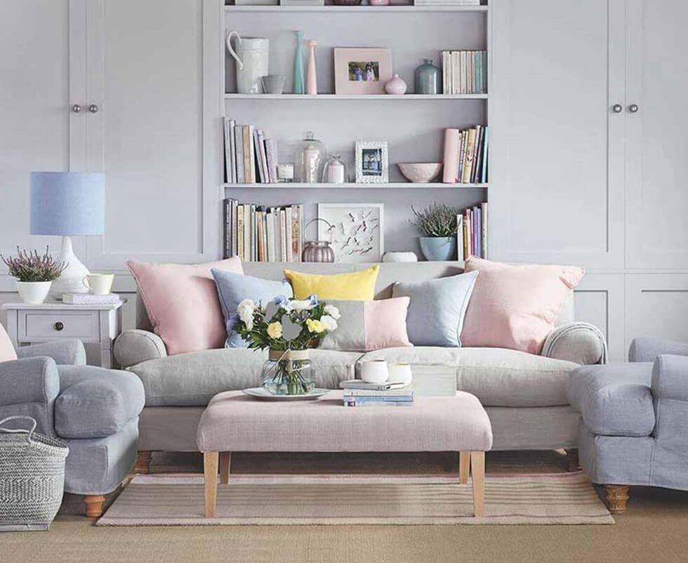 Grey living room with pastel accessories