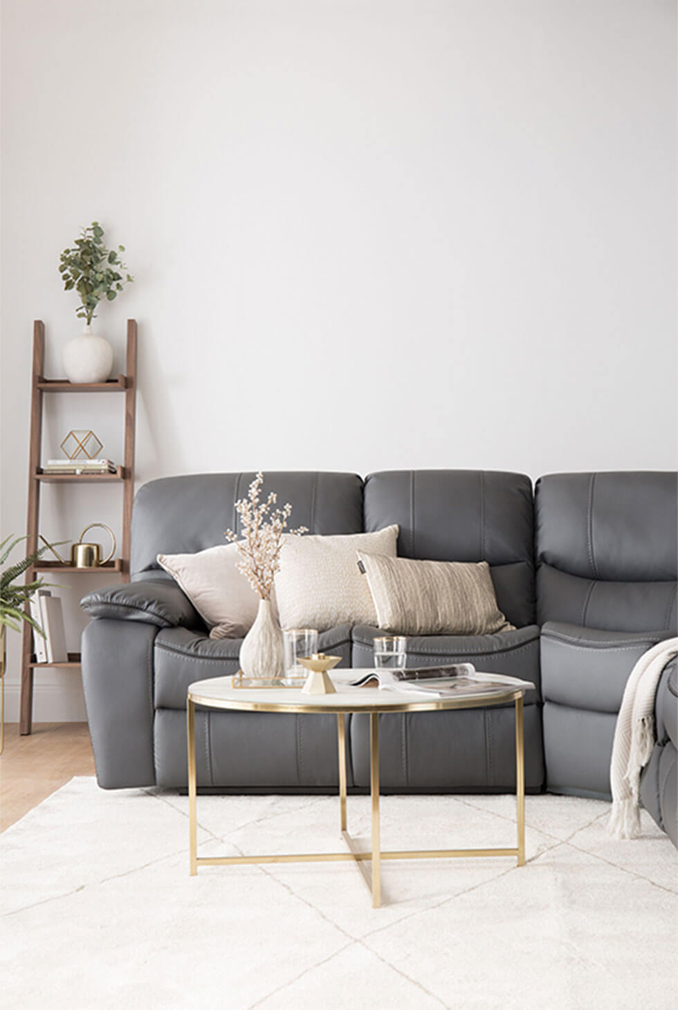 Grey leather corner sofa in a contemporary lux living room