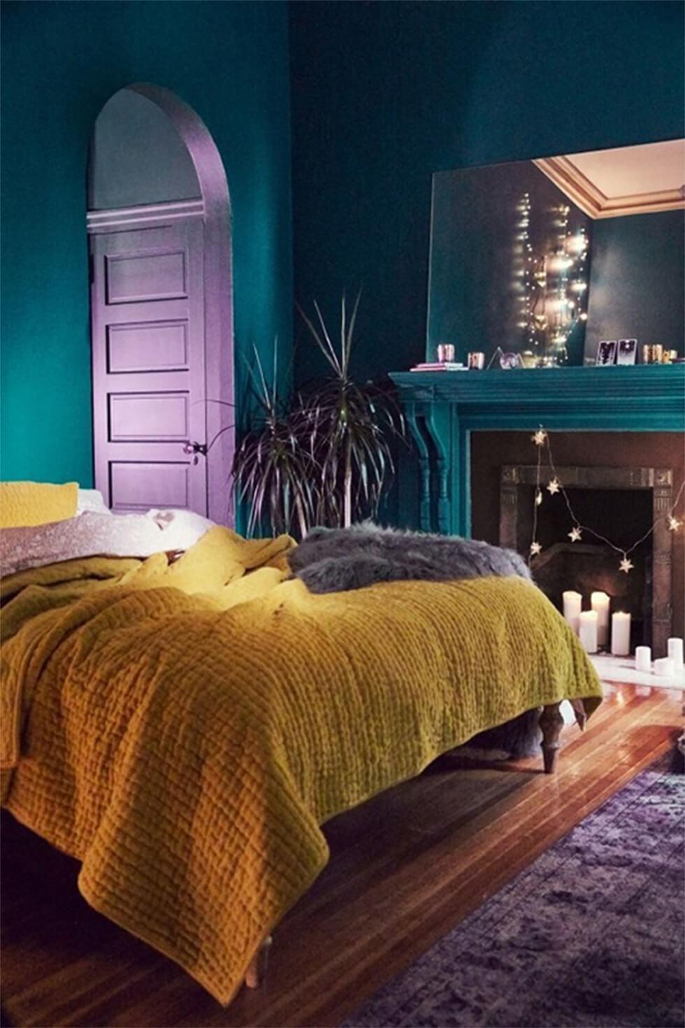 Teal and purple bedroom with mustard bedding