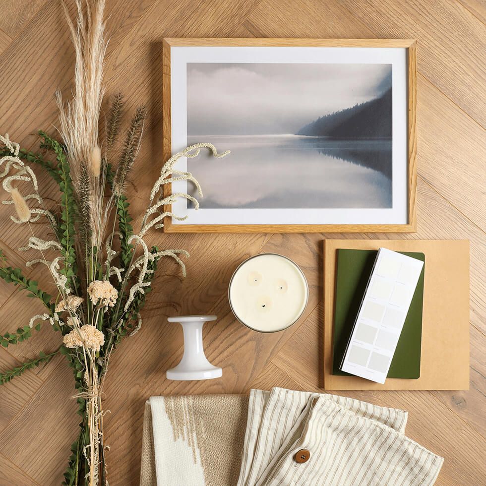 Moodboard with wood, photograph, fabric and greenery