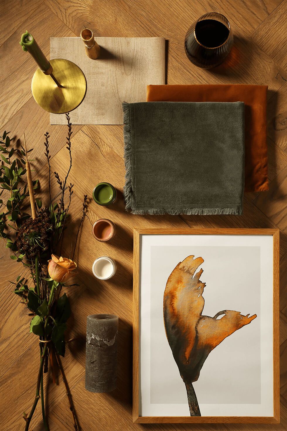 Moodboard with rich, mossy greens, golden accents and browns.