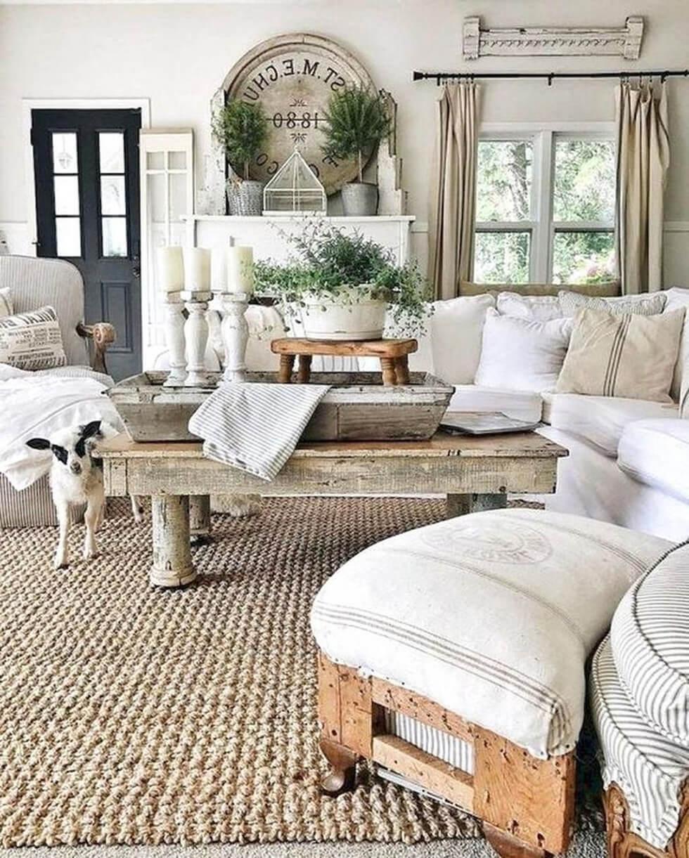 Neutral living room in a classic farmhouse style with taupe sofas