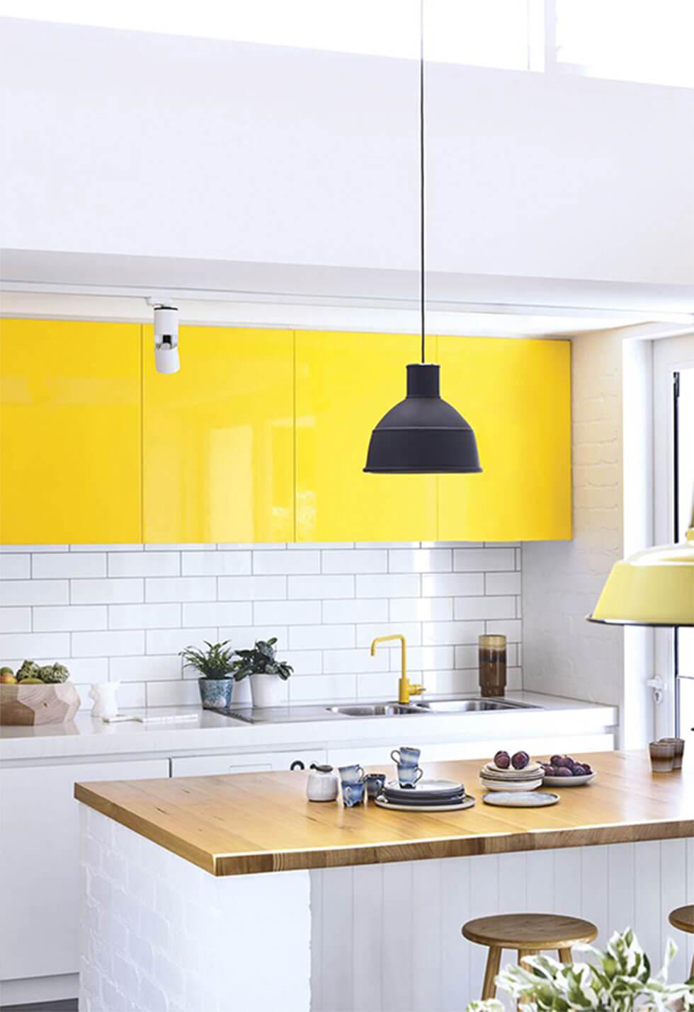 Yellow cabinetry in a contemporary kitchen