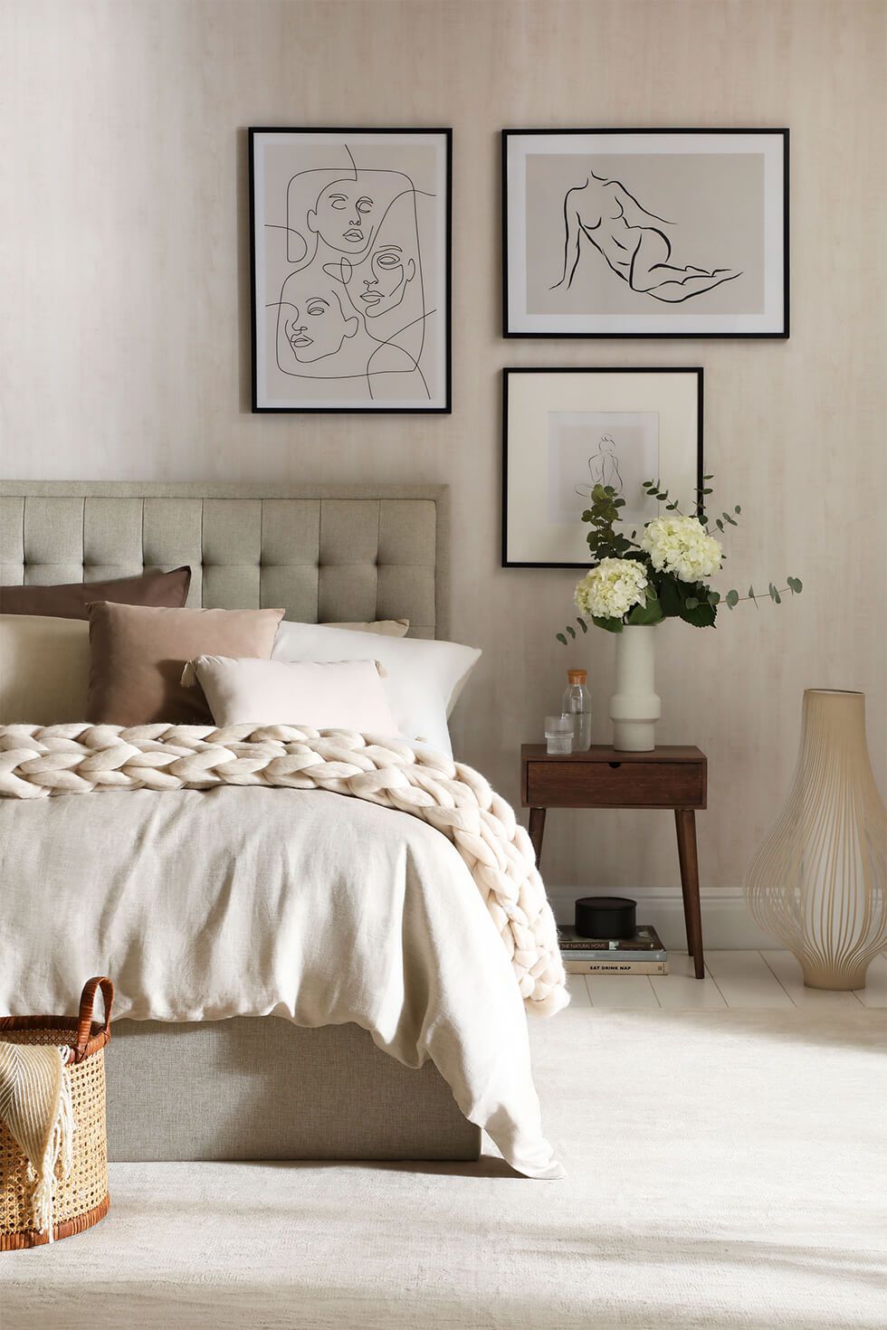 Small bedroom with a simple layout and neutral palette