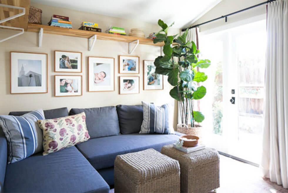 Country living room with large blue corner sofa