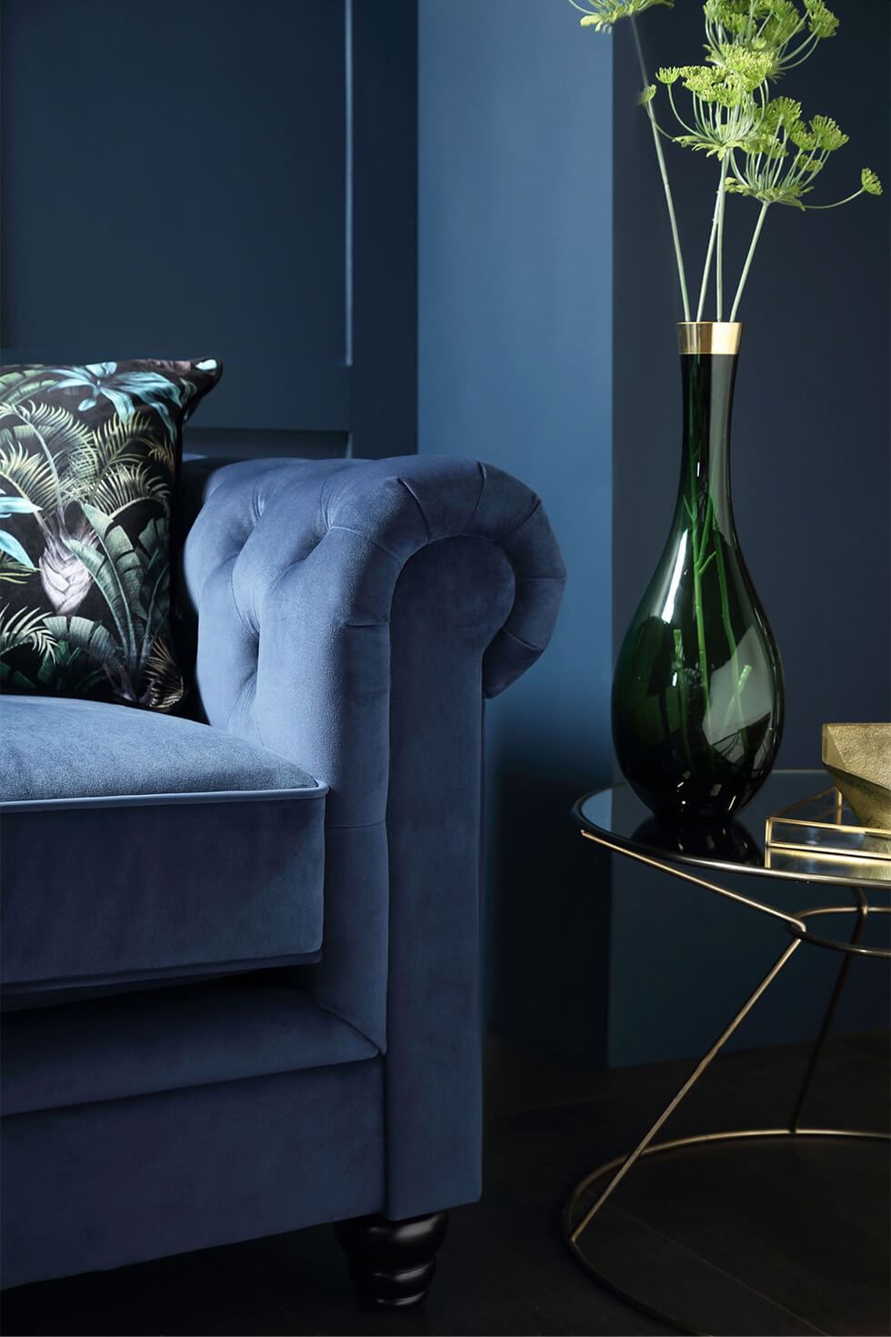 Art Deco living room with velvet sofa and gold coffee table