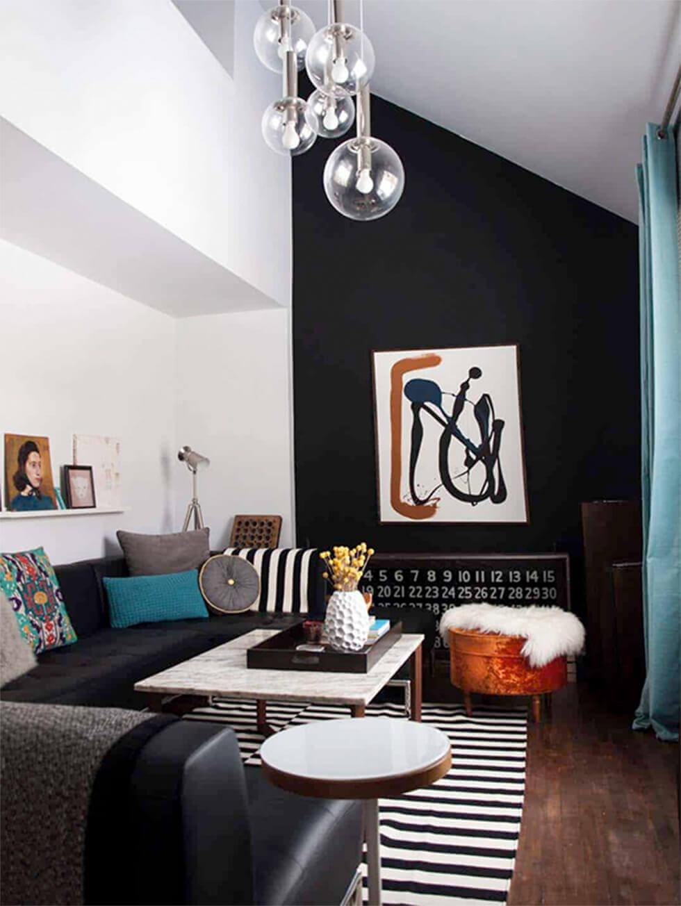 black feature wall in a small living room