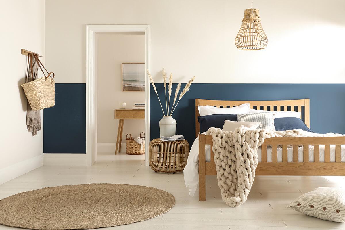 Blue and white bedroom in a modern coastal style