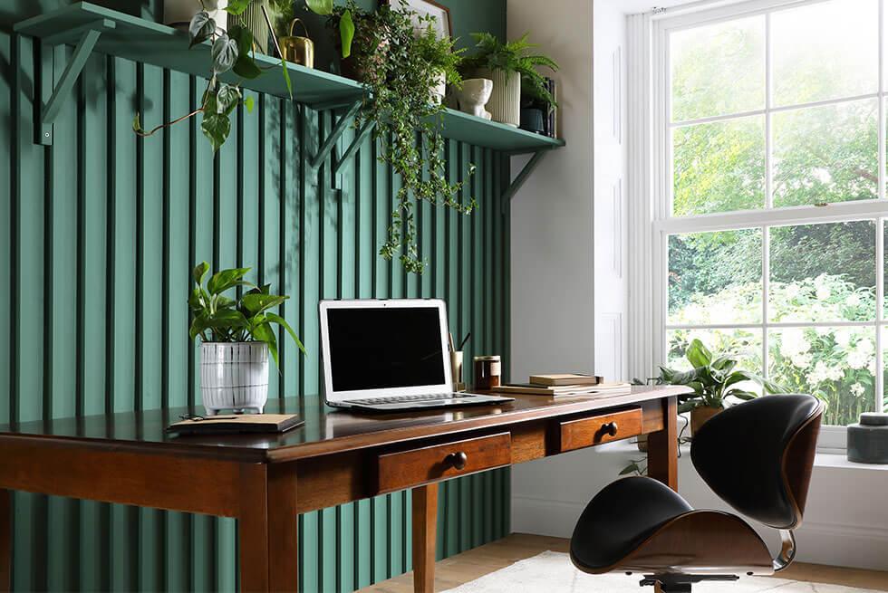 Hobby wood by earthborn green wall paint with a walnut dining table