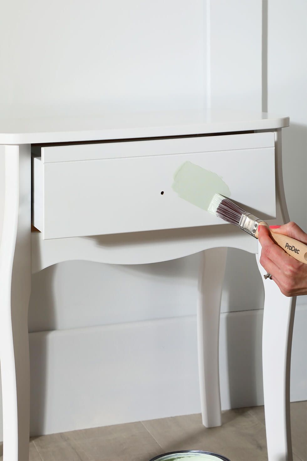 Paint the bedside table light green