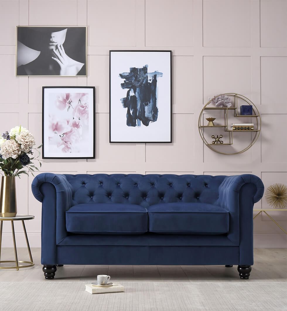 Navy sofa with a rich velvet texture