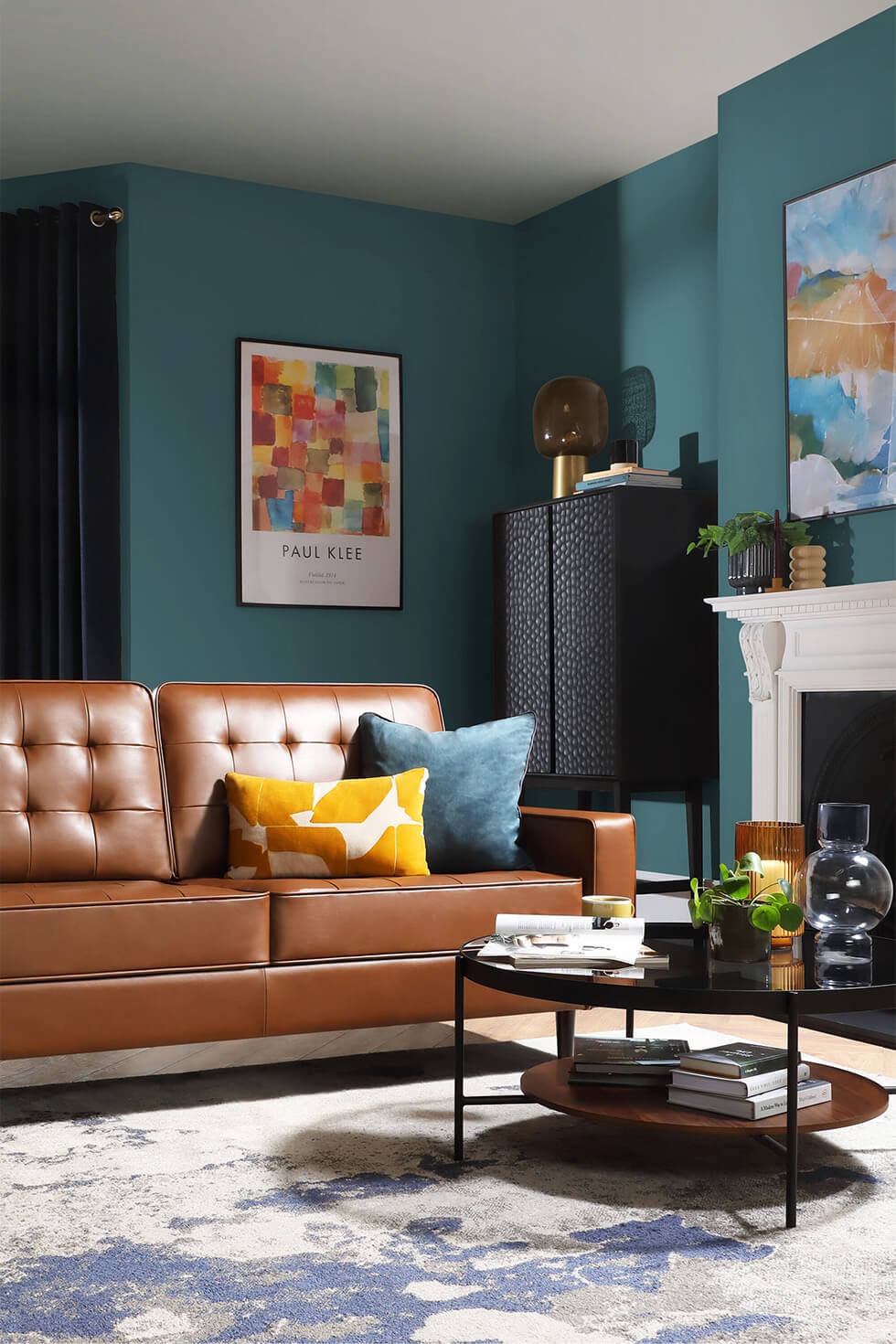 Blue living room with teal walls