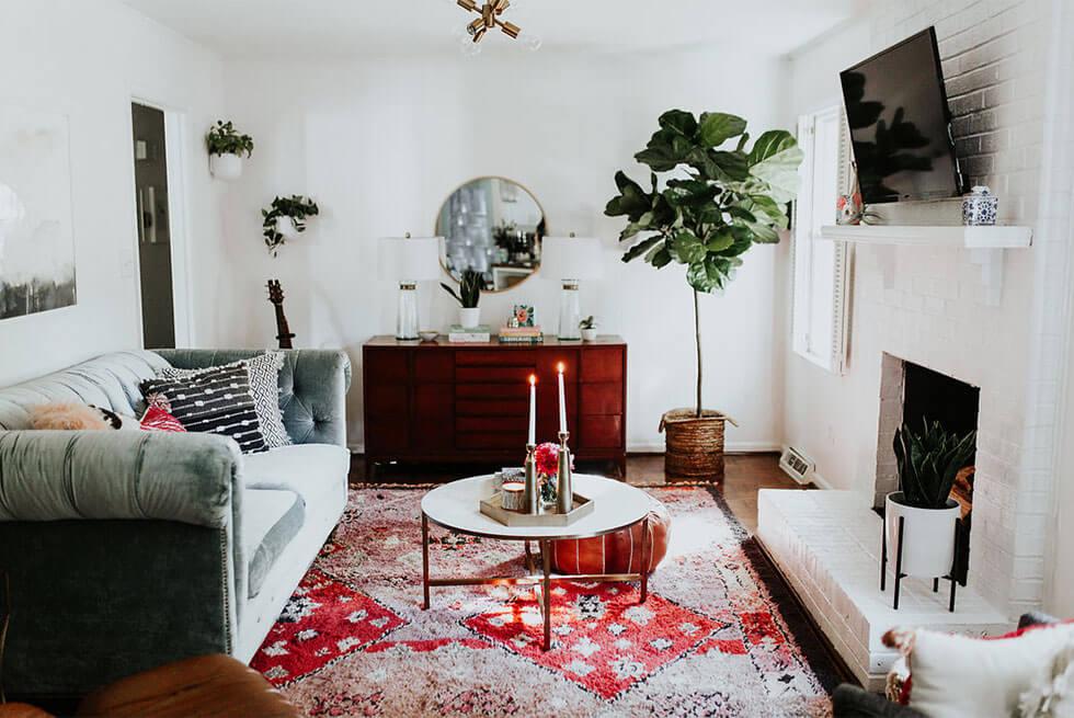 White living room with a red printed rug