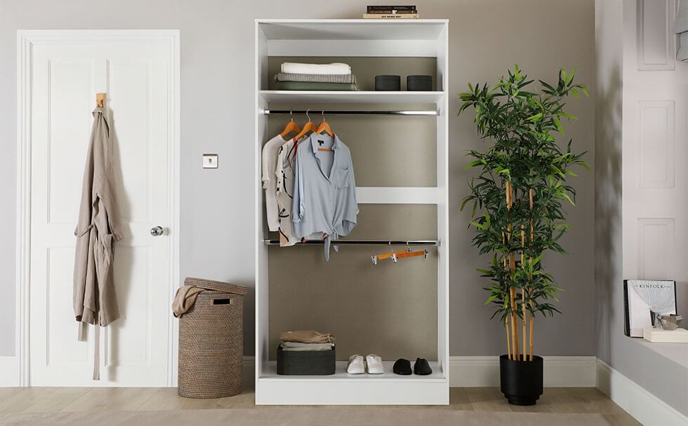 A wardrobe with two hanging rails to maximise storage