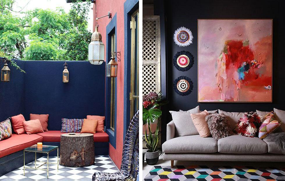 Dark navy walls with coral decor and furniture.