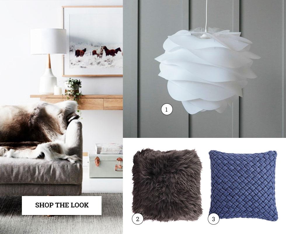 Scandinavian accessories including a sculptural lamp and cosy cushions.