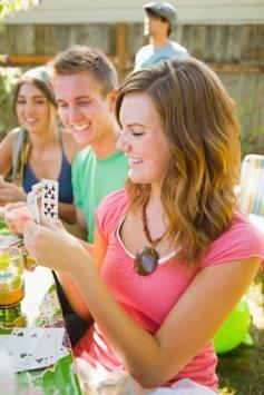 Guests playing a card game.