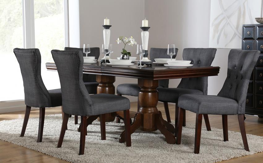 Grey fabric chairs and dark wood table