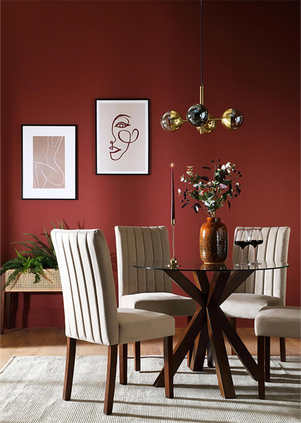 Red dining room with wooden dining table and fabric dining chairs