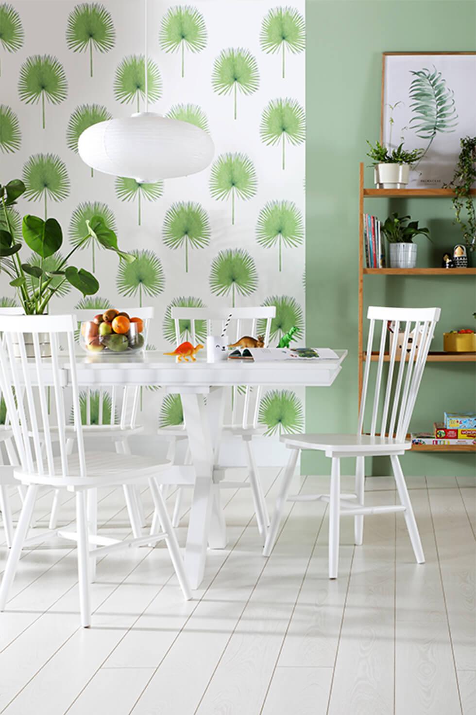 Green dining room with white dining set