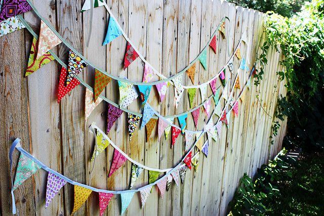 Party decoration on wooden fence.