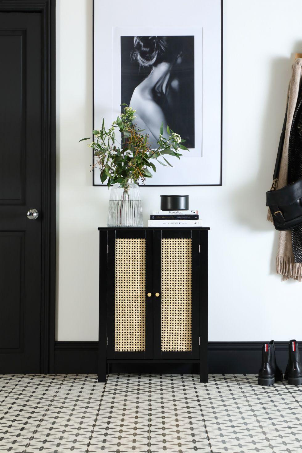 Step 6 - Completed DIY rattan sideboard in an entrance way topped with a fresh plant