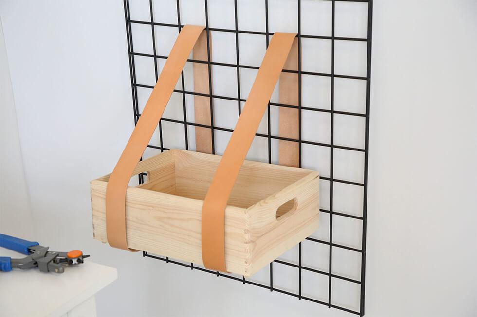 Step 2 - Thread the leather roll around the crate