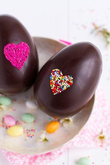 Chocolate eggs with assorted toppings. 