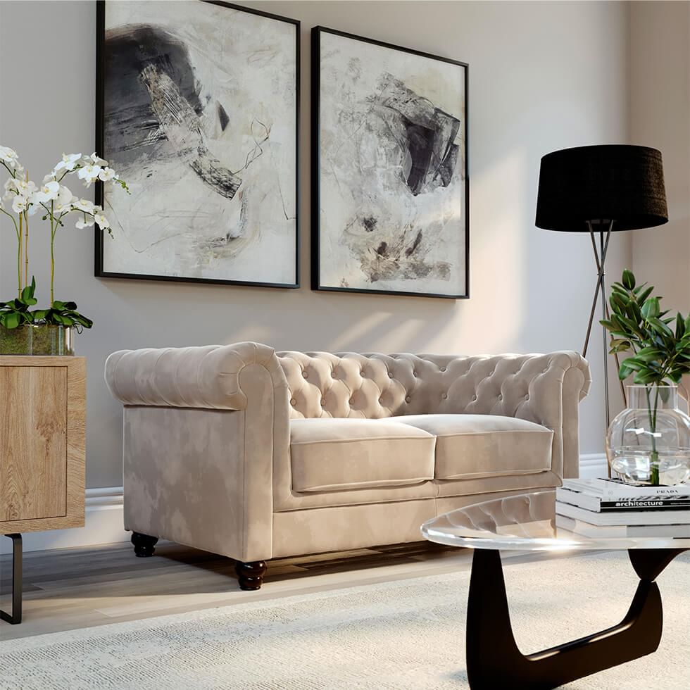 Feng shui for living room featuring a sofa with round arms