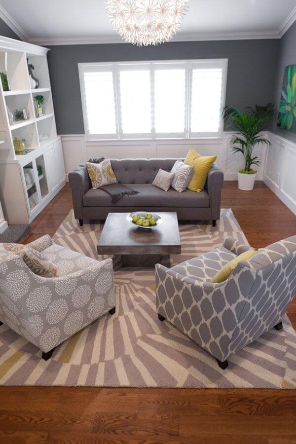 Living room with patterned carpet and armchairs