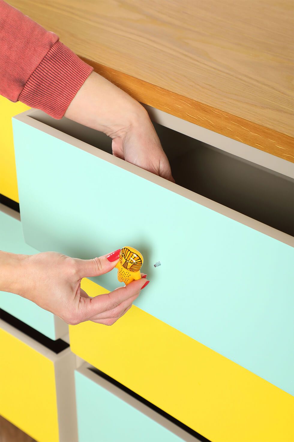 Attach animal drawer knobs