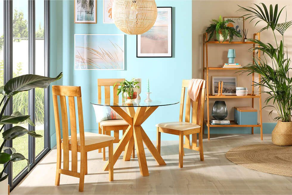 Sky blue living room with oak dining set and relaxing natural textures