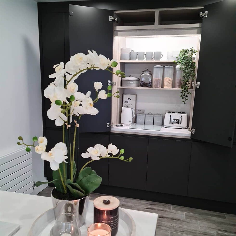 Built-in breakfast cupboard in stylish kitchen pantry