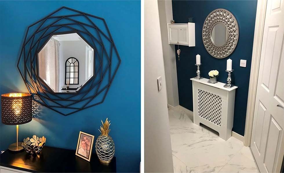 blue and white hallway with statement silver mirror