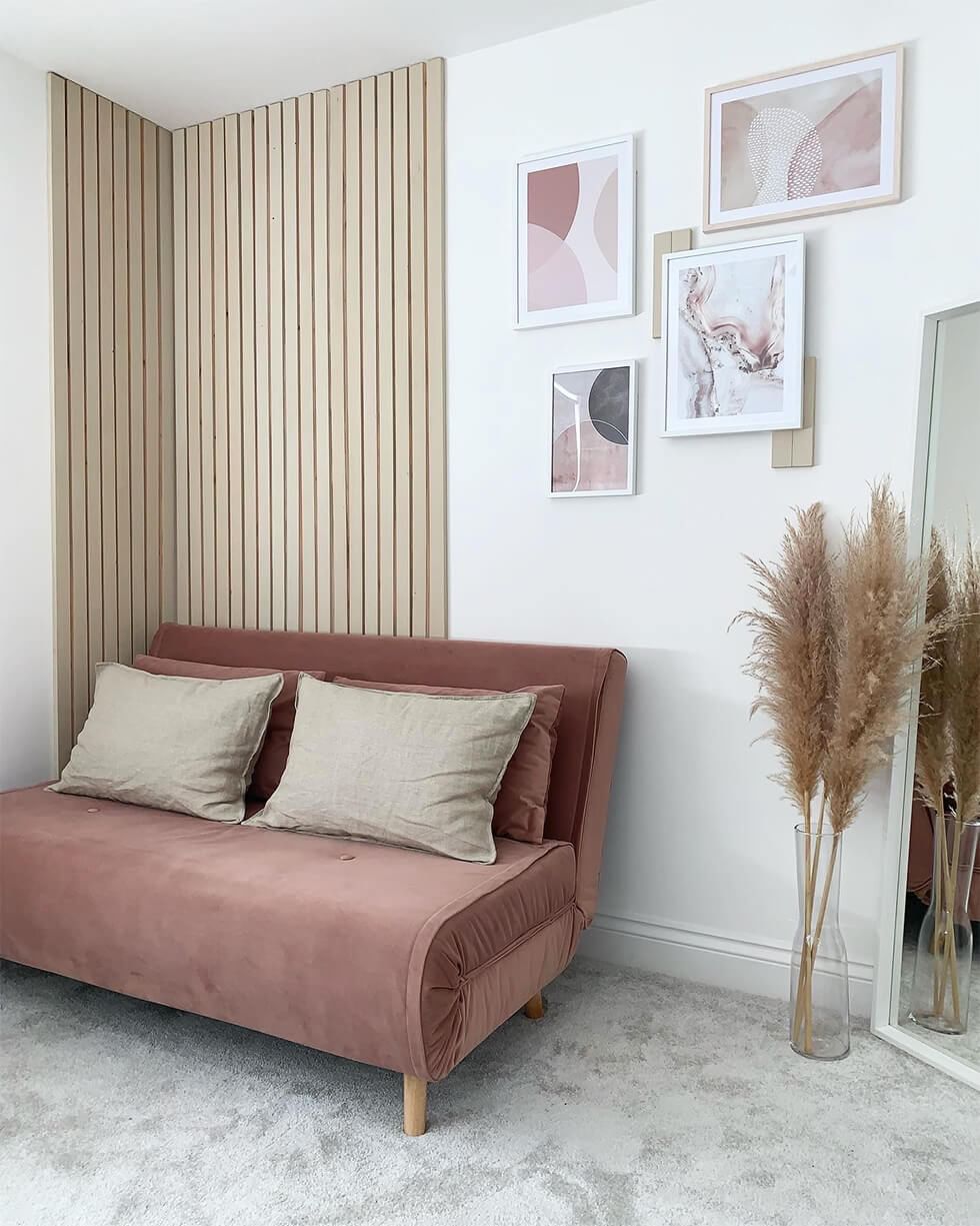 Cheerful pink bedroom with wooden accents