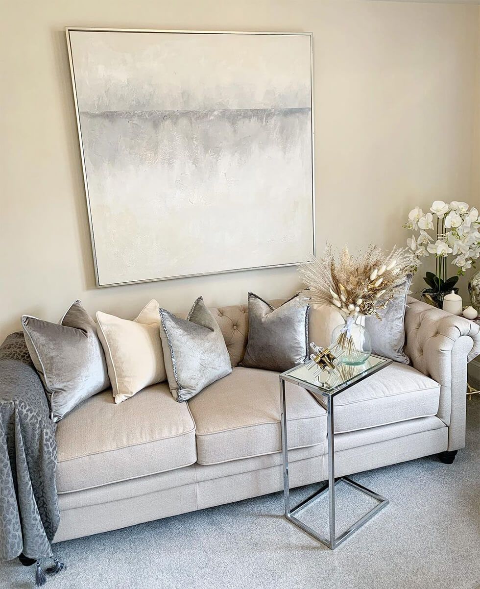 Hampton sofa with a variety of velvet and satin cushions