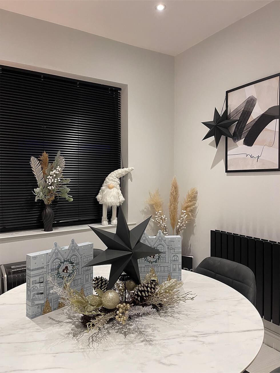 Close up of monochrome dining room with round dining set