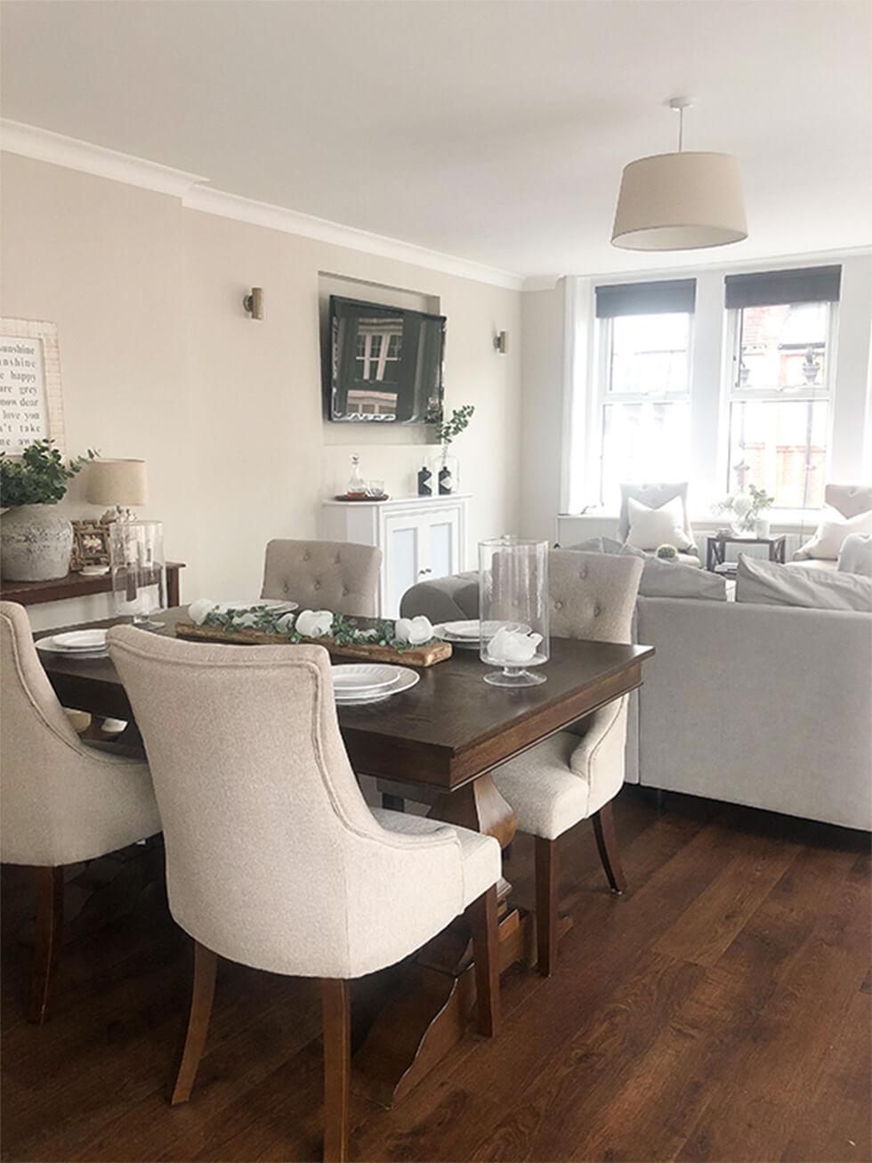 open space neutral living room and dining room