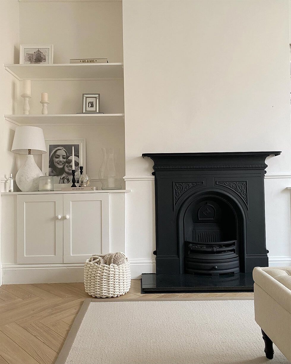 Matt black fireplace in neutral chic living room