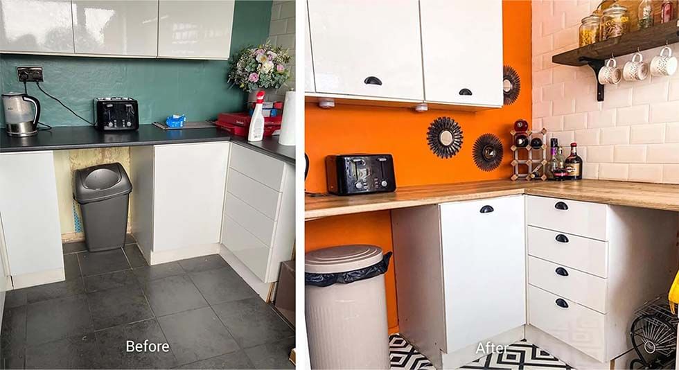 kitchen with white cabinetry orange walls and white subway tile backsplash