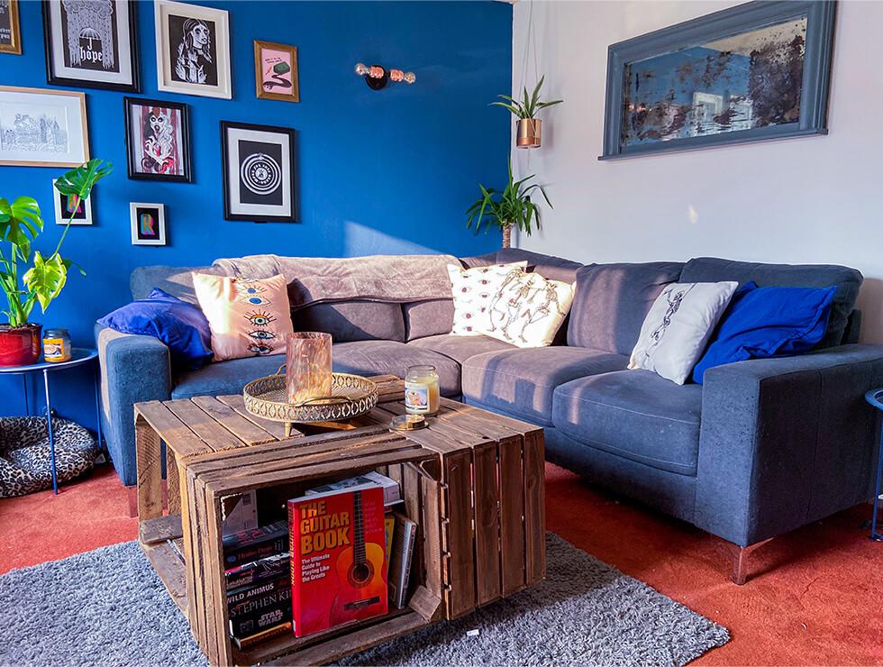 dark grey fabric corner sofa in a modern living room