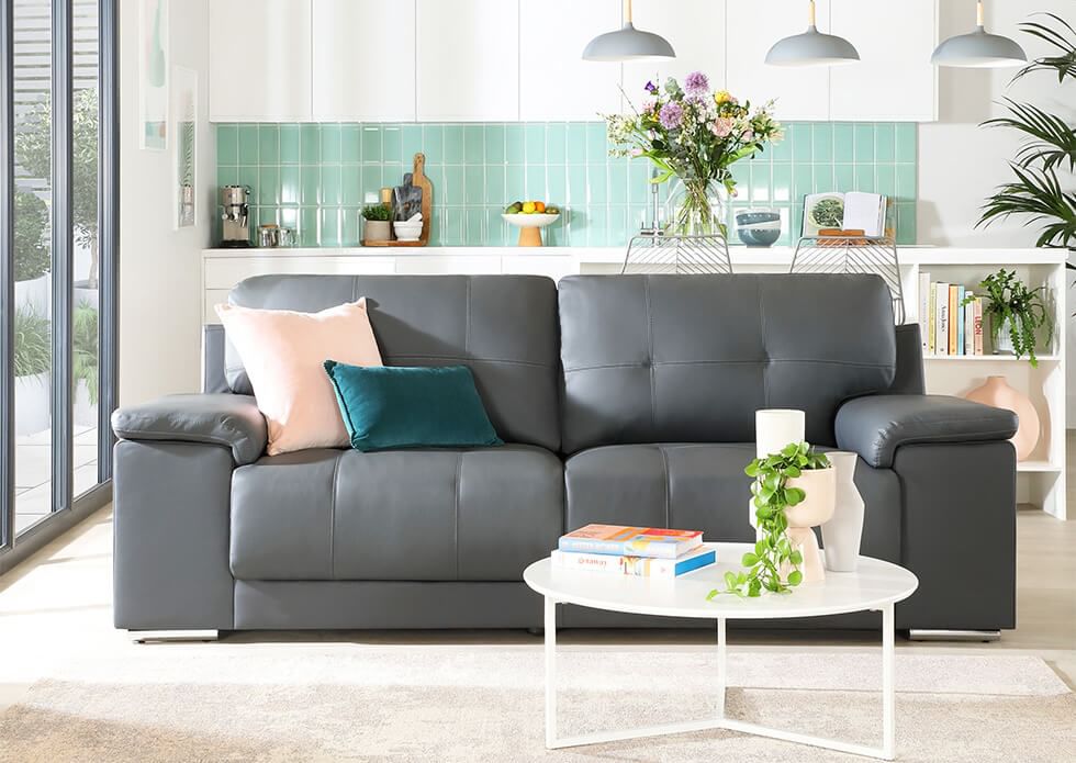 Grey faux leather sofa in the living room