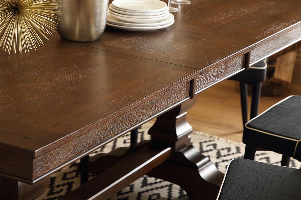 Close up of elegant, polished dark wood dining table
