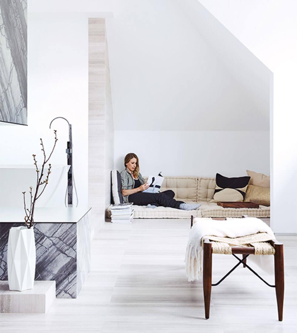 calm white reading corner with box cushions